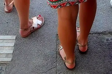 Beautiful Legs And Feet In Sandals Of Two Attractive Young Women - free porn video