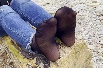 Feet In Black And Grey Nylon Socks Wiggling Toes At The Seashore - free porn video