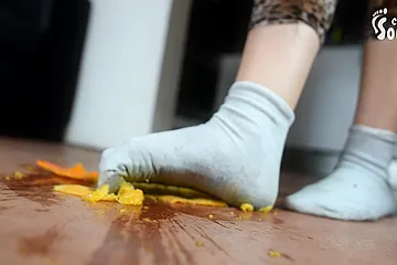 Wild Brunette In Socks Crashes An Orange With Her Feet - free porn video